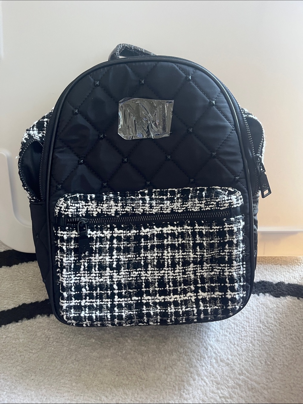 Badgley Mischka Black Quilted Backpack with Black-and-White Tweed Pocket, vegan
